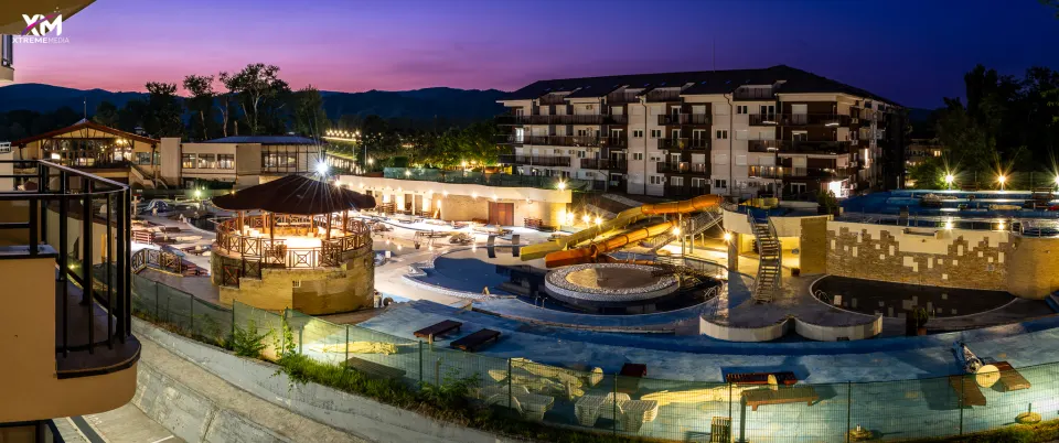 The aqua park lit up at night