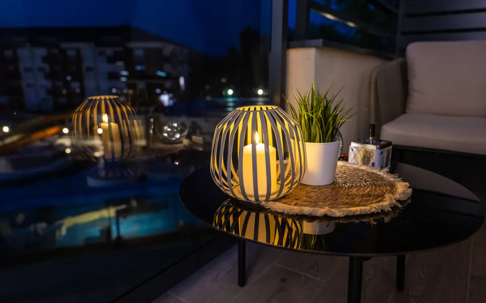 Winter evening with candles on the apartment terrace at Silver Lake in the off season